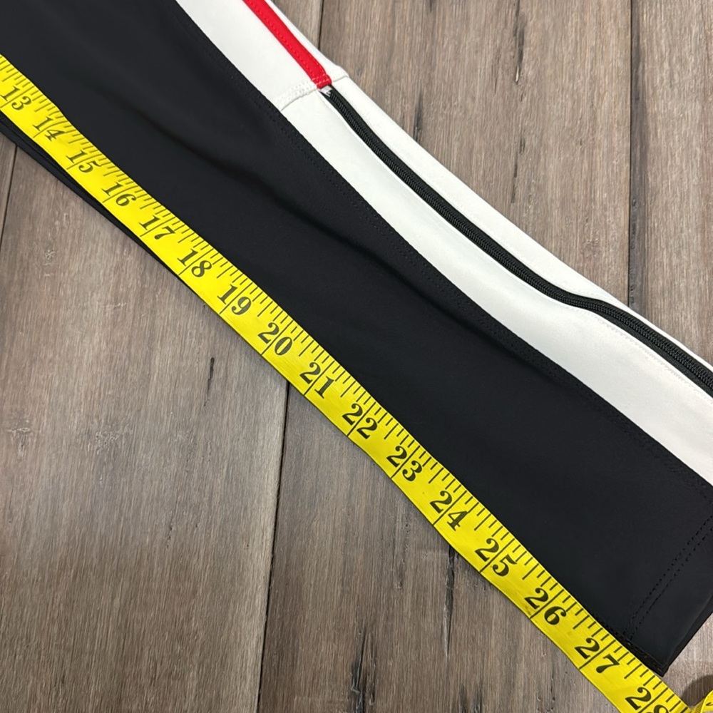 FP Movement Dale leggings Black Track Pants with Red and White Accents - Picture 9 of 9